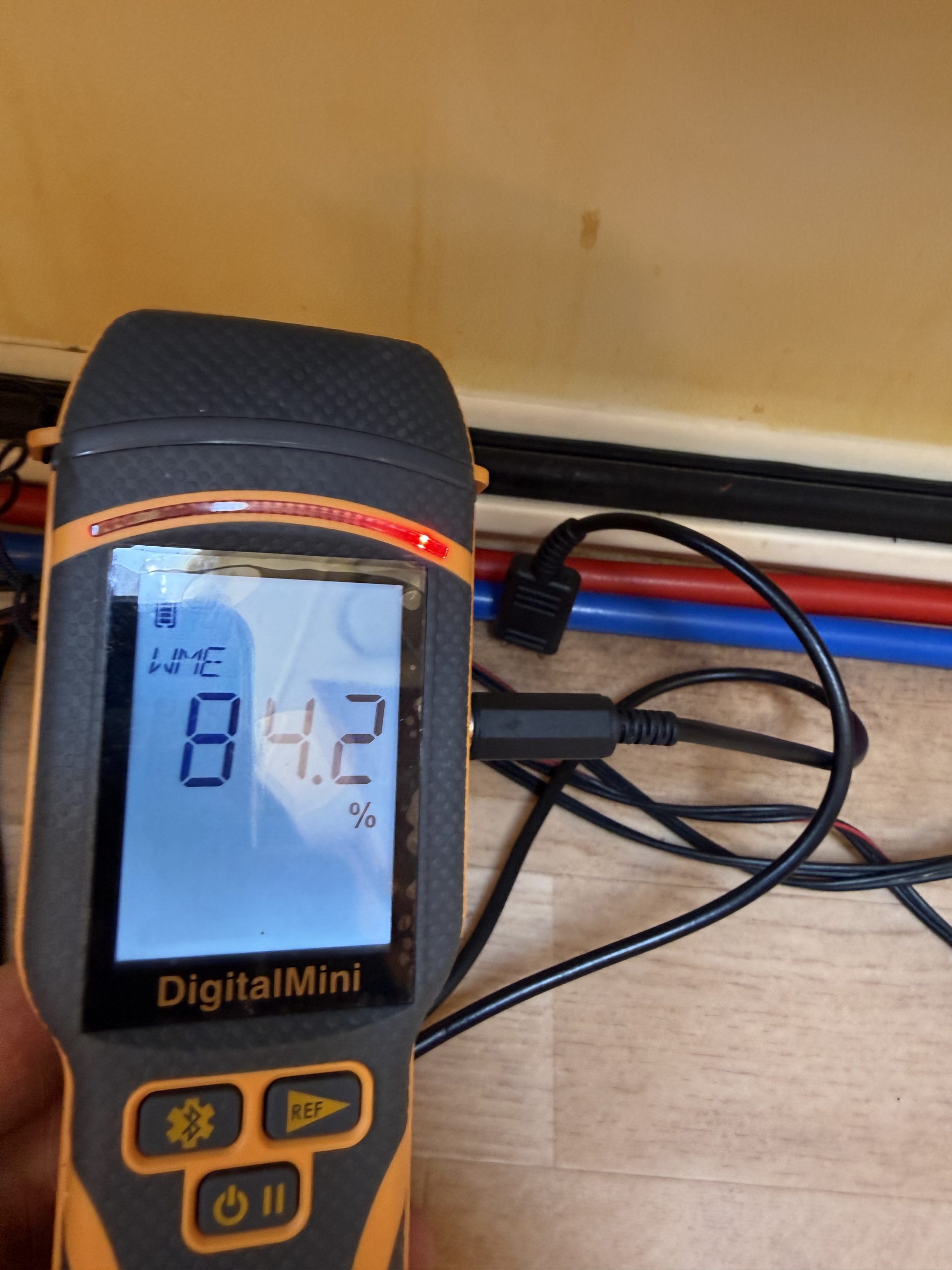 Moisture meter showing 84.2 percent WME